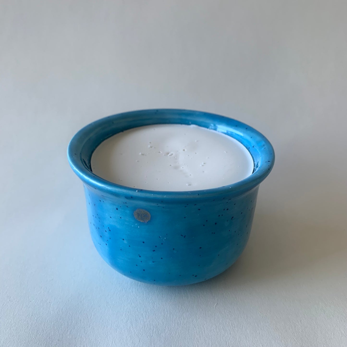 blue ramekin with solid white soap