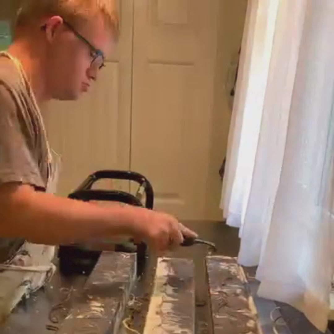 Load video: A video of Simon and Caroline making soap together and displaying various Simon's Soapbox products.